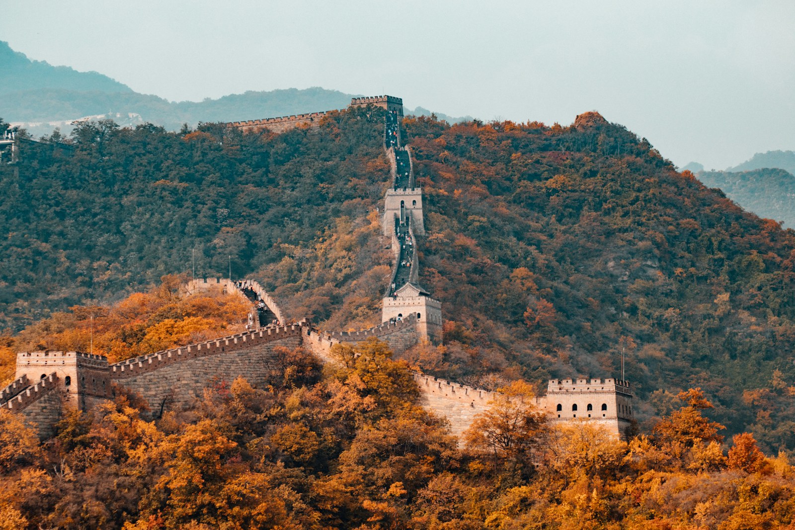The Great Wall of China among autumn hills